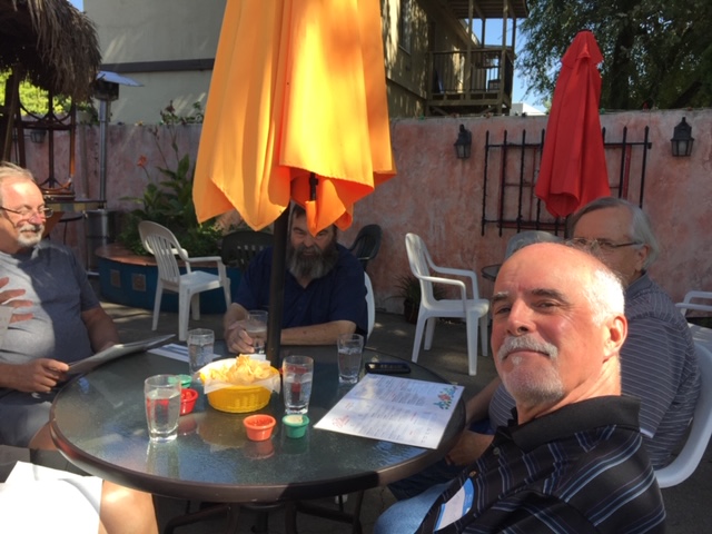 Steve Barker under umbrella, Jim Barkelew, & Tom Mouser